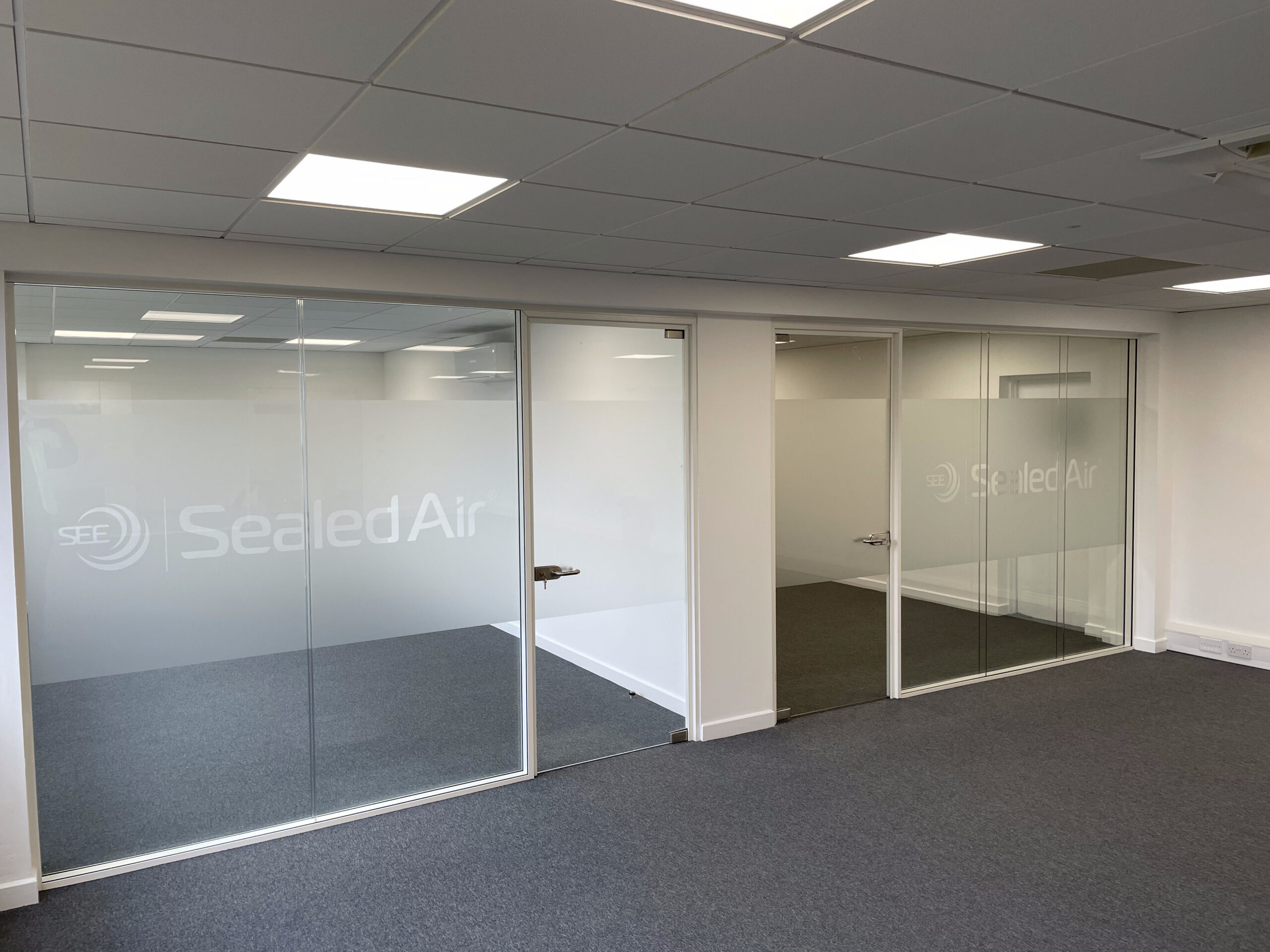 Refurbished office with glazed meeting room